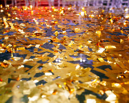 Golden confetti With Sparkling Glitter - Christmas Holidays and party backgroundの写真素材