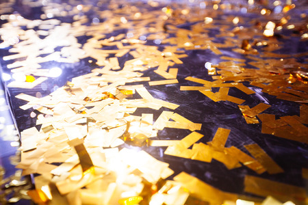 Golden confetti With Sparkling Glitter - Christmas Holidays and party backgroundの写真素材