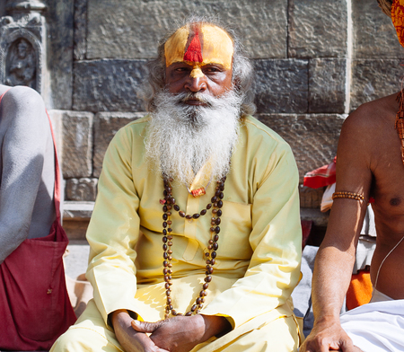 KATHMANDU - FEBRUARY 17: Sadhu at Pashupatinath Temple in Kathmandu, Nepal on Feb 17, 2017. Sadhus are holy men who have chosen to live an ascetic life and focus on the spiritual practice of Hinduismのeditorial素材