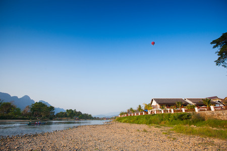 Hot air balloon on sky in Laos, Vang Viengのeditorial素材