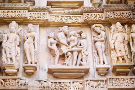 Ancient bas-relief at famous erotic temple in Khajuraho, India. Unesco World Heritage Siteの写真素材