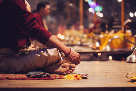 VARANASI, INDIA- 23 JANUARY 2017 : A Hindu priest performs the Ganga Aarti ritual in Varanasi. Fire puja is a Hindu ritual that takes place at Dashashwamedh Ghat on the banks of the river Gangesのeditorial素材