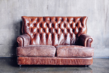 Beautiful living room with vintage style  leather sofaの写真素材
