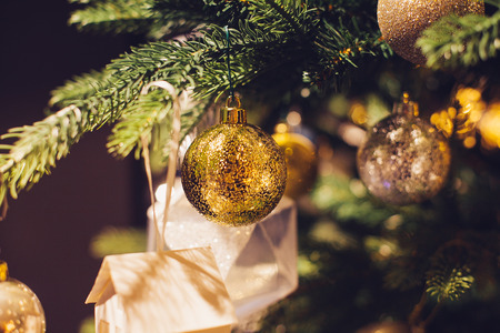 Decorated Christmas tree on blurred, sparkling and fairy backgroundの写真素材