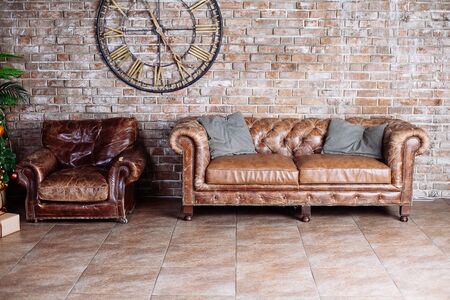 vintage style of interior decoration the leather sofa in roomの写真素材