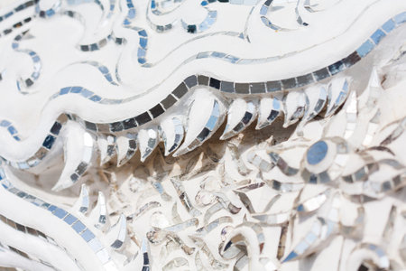 Detail of Famous Thailand temple or grand white church at Chiang Rai province, northern Thailandの写真素材