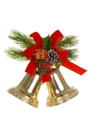 Two handbells, red tape, branches of a fur-tree on a white backgroundの写真素材