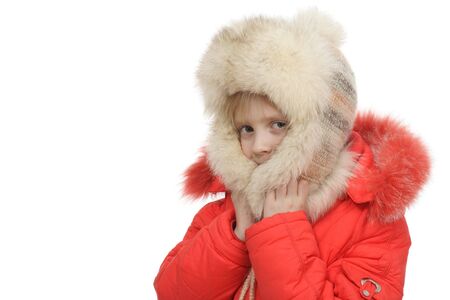 The girl in a fur cap on a white backgroundの写真素材