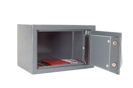 The open safe with documents on a white backgroundの写真素材