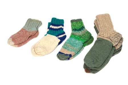 Different woolen socks on a white backgroundの写真素材