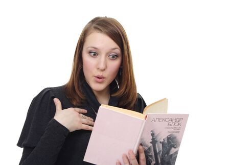 The girl reads the bookの写真素材