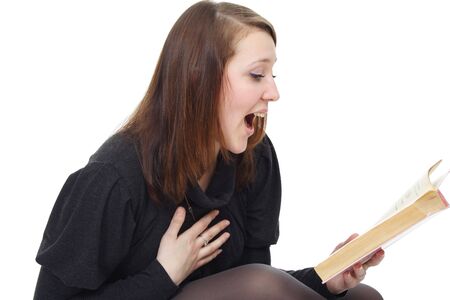 The girl reads the bookの写真素材