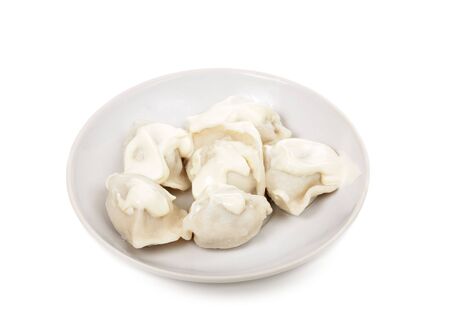 a dish with meat dumplings is isolated on a white backgroundの写真素材