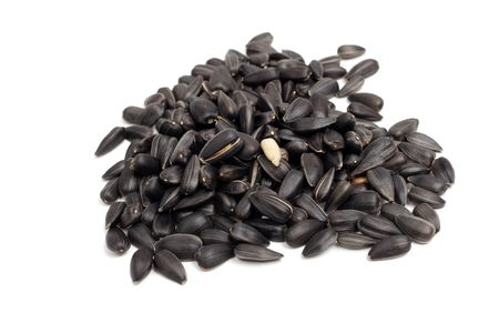 Sunflower seeds are isolated on a white backgroundの写真素材