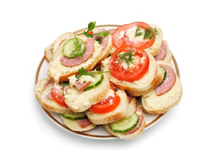 Different sandwiches in a plate are isolated on a white backgroundの写真素材