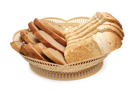 White and grey bread in a basket are isolated on a white backgroundの写真素材