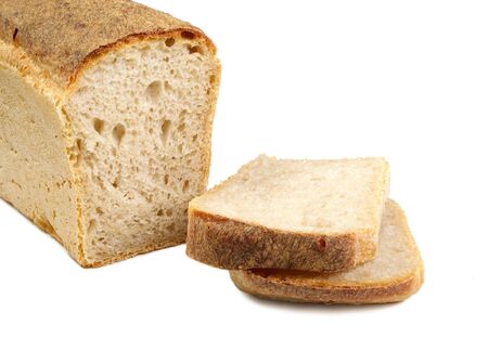 The loaf of bread is isolated on a white backgroundの写真素材