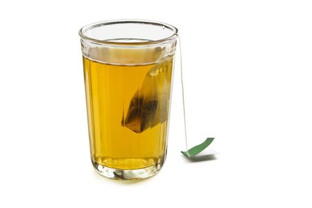 Glass with tea on a white backgroundの写真素材