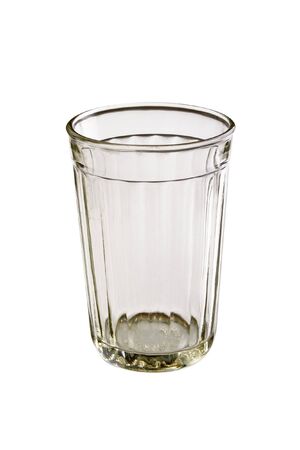 The empty glass is isolated on a white backgroundの写真素材