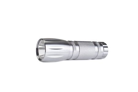 Metal coated flashlight isolated on whiteの写真素材