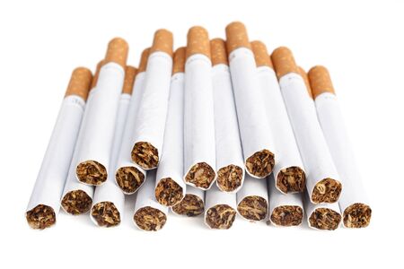 Cigarettes with the filter are isolated on a white backgroundの写真素材