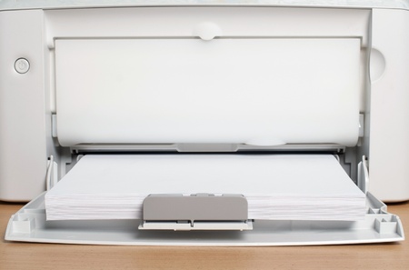The laser printer with a paper ready for printing