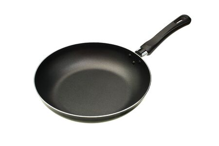 The black frying pan is isolated on a white backgroundの写真素材
