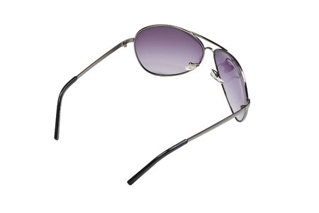 sunglasses with dark glasses are isolated on a white backgroundの写真素材
