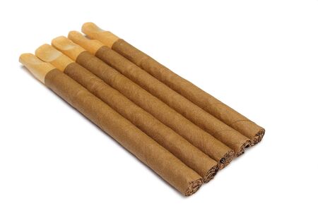 Cigar with a wooden mouthpiece it is isolated on a white backgroundの写真素材