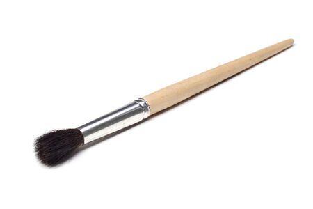 wooden paintbrush isolated on white backgroundの写真素材