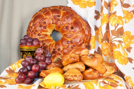 Still Life in the Russian style with pastries and other foods 