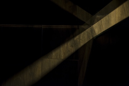 A ray of light on the wooden floor の写真素材