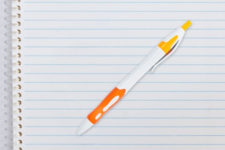 Close up of blank notebook paper with ball penの写真素材