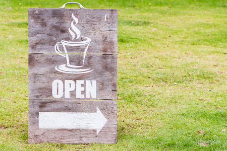 Wooden open sign board for coffee shop or cafeの写真素材