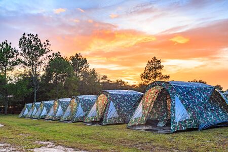 Tents camping area at dusk on Phu Kradueng National Park, Loei province, Thailand, HDR image