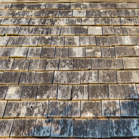 Old wooden roof tiles of the old houseの写真素材