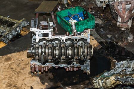 Internal part of car engine under repair, flash fired