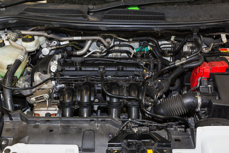 Old car engine under repairingの写真素材