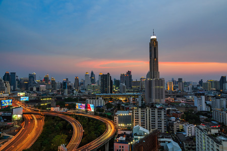 BANGKOK, THAILAND - 16 APRIL 2016 - Scene of Bangkok high-rise buildings and traffic light trails on...