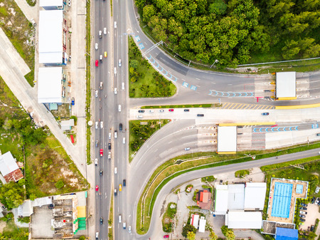 Aerial view from drone of T-junction at the exit and entrance to expressway (motorway), Thailand