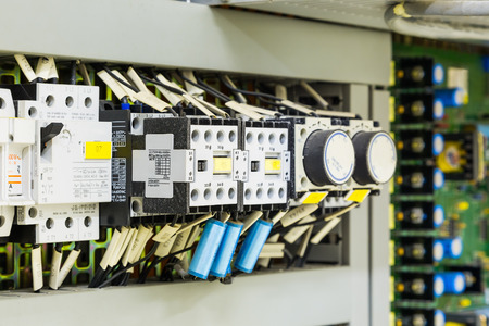 Electrical control devices installed in control cubicle including magnetic contactors, circuit breakers, timer relays and etc.のeditorial素材