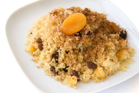 Seffa de Couscous, a traditional sweet dish from Algeria and Morocco made with cinnamon and dried fruits like raisins and apricots.の写真素材