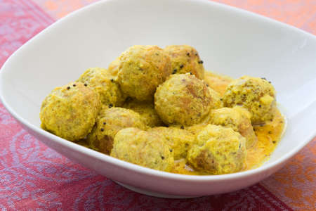 Bowl with a falafel curry which is a typical Indian dish.