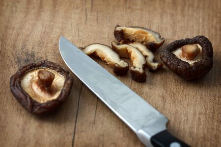 Close-up image with selective focus of Asian shiitake mushrooms which are cut.の写真素材