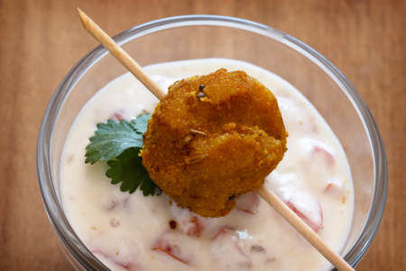Fried falafels which are served with a yogurt dip.の写真素材