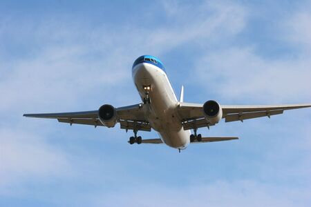 jet coming into airportの写真素材