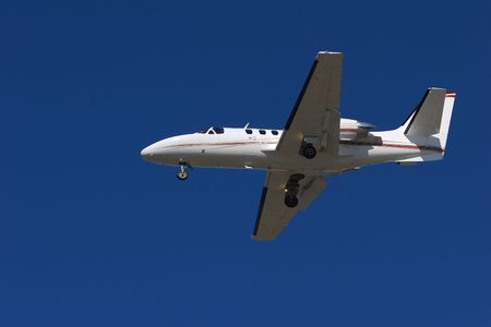 Small corporate jet coming into landの写真素材