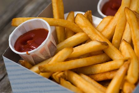 french fries and ketchup, fast food snackの写真素材