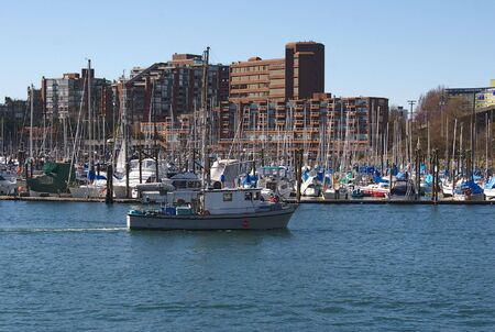 boat leaving Vancouver harbour for a day on the waterの写真素材