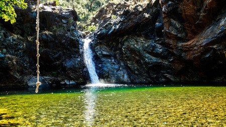 Waterfall and pond in the jungle.
